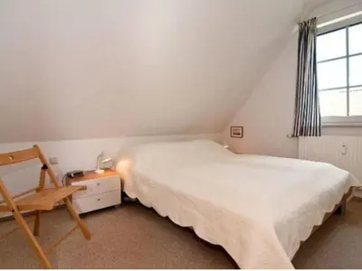 Ein Bett oder Betten in einem Zimmer der Unterkunft Möwennest - a59239