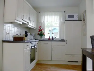 Küche/Küchenzeile in der Unterkunft Anlage Dünengarten Ferienhaus Seebrise