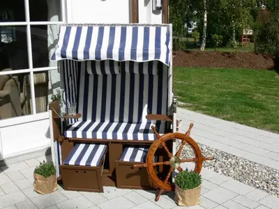 Ein Garten an der Unterkunft Anlage Dünengarten Ferienhaus Seebrise