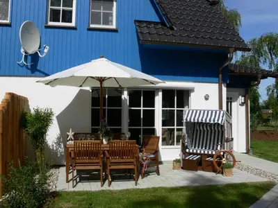 Ein Garten an der Unterkunft Anlage Dünengarten Ferienhaus Seebrise