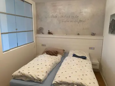 Ein Bett oder Betten in einem Zimmer der Unterkunft Ferienwohnung 2 Müller