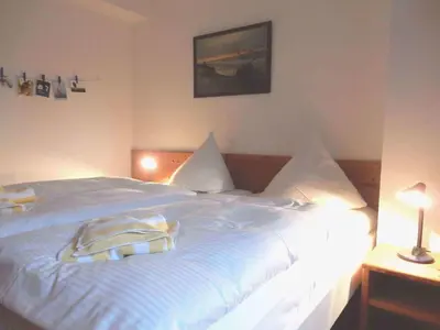 Ein Bett oder Betten in einem Zimmer der Unterkunft Resi E02