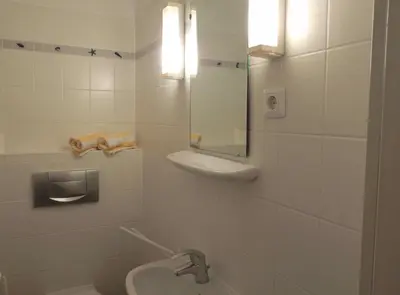 Ein Badezimmer in der Unterkunft Resi E02