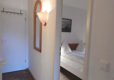 Ein Bett oder Betten in einem Zimmer der Unterkunft Resi E02