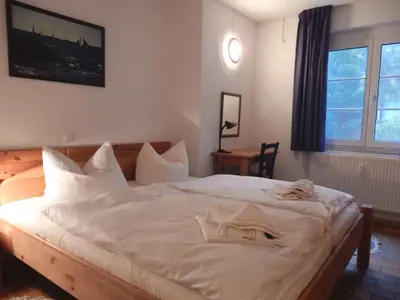 Ein Bett oder Betten in einem Zimmer der Unterkunft Resi E04