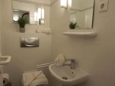 Ein Badezimmer in der Unterkunft Resi E04