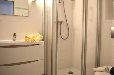 Ein Badezimmer in der Unterkunft Resi E04