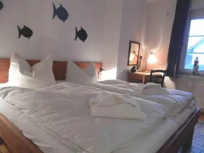 Ein Bett oder Betten in einem Zimmer der Unterkunft Resi H02