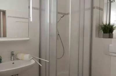 Ein Badezimmer in der Unterkunft Resi H02