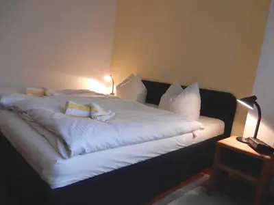 Ein Bett oder Betten in einem Zimmer der Unterkunft Resi D04