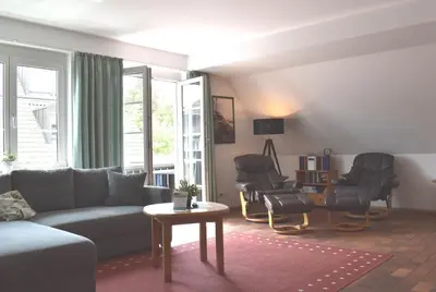 Ein Sitzbereich in der Unterkunft Resi E05