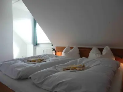 Ein Bett oder Betten in einem Zimmer der Unterkunft Resi E05