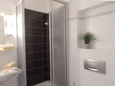 Ein Badezimmer in der Unterkunft Resi E05