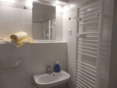 Ein Badezimmer in der Unterkunft Resi E06