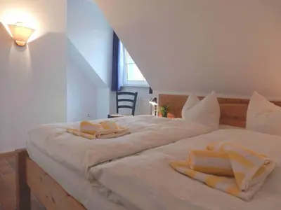 Ein Bett oder Betten in einem Zimmer der Unterkunft Resi E08