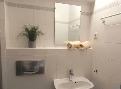 Ein Badezimmer in der Unterkunft Resi E08