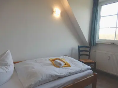 Ein Bett oder Betten in einem Zimmer der Unterkunft Resi K6