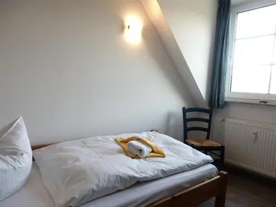Ein Bett oder Betten in einem Zimmer der Unterkunft Resi K6