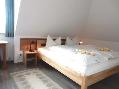 Ein Bett oder Betten in einem Zimmer der Unterkunft Resi K6