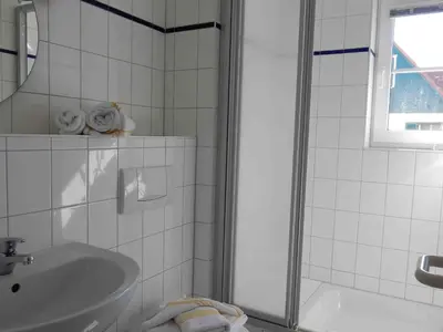 Ein Badezimmer in der Unterkunft Gästehaus 7