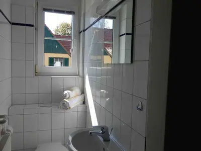 Ein Badezimmer in der Unterkunft Gästehaus 7