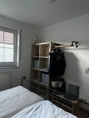 Ein Bett oder Betten in einem Zimmer der Unterkunft Igel