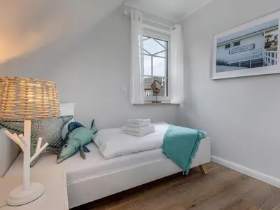 Ein Bett oder Betten in einem Zimmer der Unterkunft Haus Nordlicht