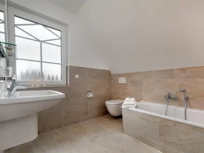 Ein Badezimmer in der Unterkunft Haus Nordlicht