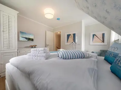 Ein Bett oder Betten in einem Zimmer der Unterkunft Haus Nordlicht