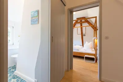Ein Bett oder Betten in einem Zimmer der Unterkunft Kuhleger
