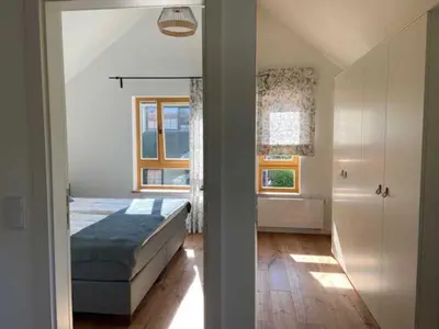 Ein Bett oder Betten in einem Zimmer der Unterkunft Ferienhaus angelangt - Prerow