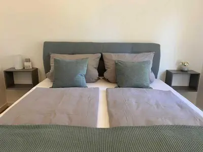 Ein Bett oder Betten in einem Zimmer der Unterkunft Ferienhaus angelangt - Prerow