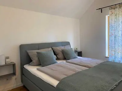 Ein Bett oder Betten in einem Zimmer der Unterkunft Ferienhaus angelangt - Prerow