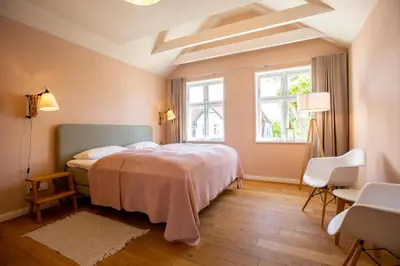 Ein Bett oder Betten in einem Zimmer der Unterkunft Kapitänshaus Luv & Lee