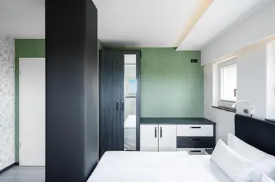 Ein Bett oder Betten in einem Zimmer der Unterkunft Panoramasuite The Turm - Penthouse