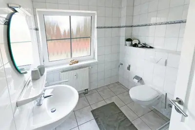 Ein Badezimmer in der Unterkunft Buchenpark - Darß Glück
