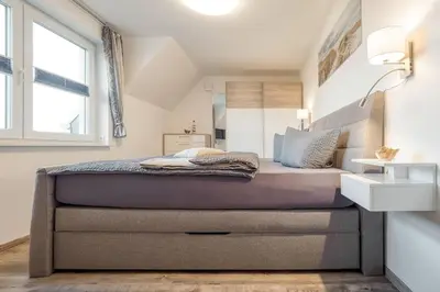 Ein Bett oder Betten in einem Zimmer der Unterkunft Buhne 119