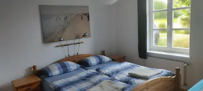 Ein Bett oder Betten in einem Zimmer der Unterkunft Ferienwohnung Rubitz