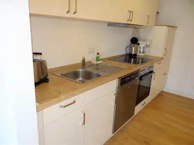 Küche/Küchenzeile in der Unterkunft Ferienanlage Haus hinter den Dünen App 6 EG 1
