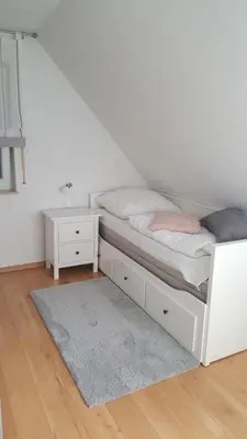 Ein Bett oder Betten in einem Zimmer der Unterkunft Haus Sonnenwind