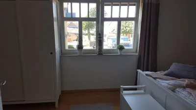 Ein Bett oder Betten in einem Zimmer der Unterkunft Haus Sonnenwind