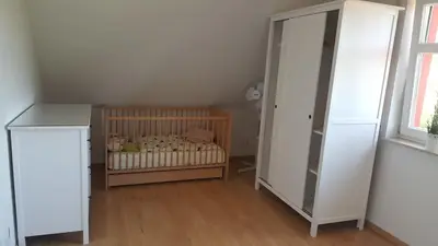 Ein Bett oder Betten in einem Zimmer der Unterkunft Haus Sonnenwind