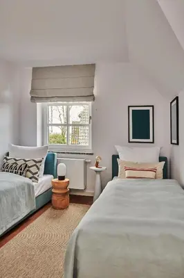 Ein Bett oder Betten in einem Zimmer der Unterkunft GRONERS Ahrenshoop