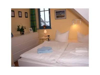 Ein Bett oder Betten in einem Zimmer der Unterkunft FH Carpe Diem