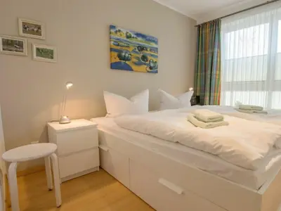 Ein Bett oder Betten in einem Zimmer der Unterkunft Kranichidyll
