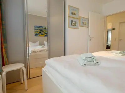 Ein Bett oder Betten in einem Zimmer der Unterkunft Kranichidyll