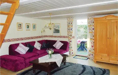Ein Sitzbereich in der Unterkunft Ferienhaus Waldreihe Q