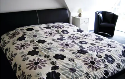 Ein Bett oder Betten in einem Zimmer der Unterkunft Ferienhaus Bauernreihe N