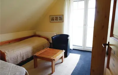 Ein Bett oder Betten in einem Zimmer der Unterkunft Ferienhaus Bauernreihe N