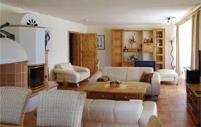 Ein Sitzbereich in der Unterkunft Ferienhaus Bauernreihe N
